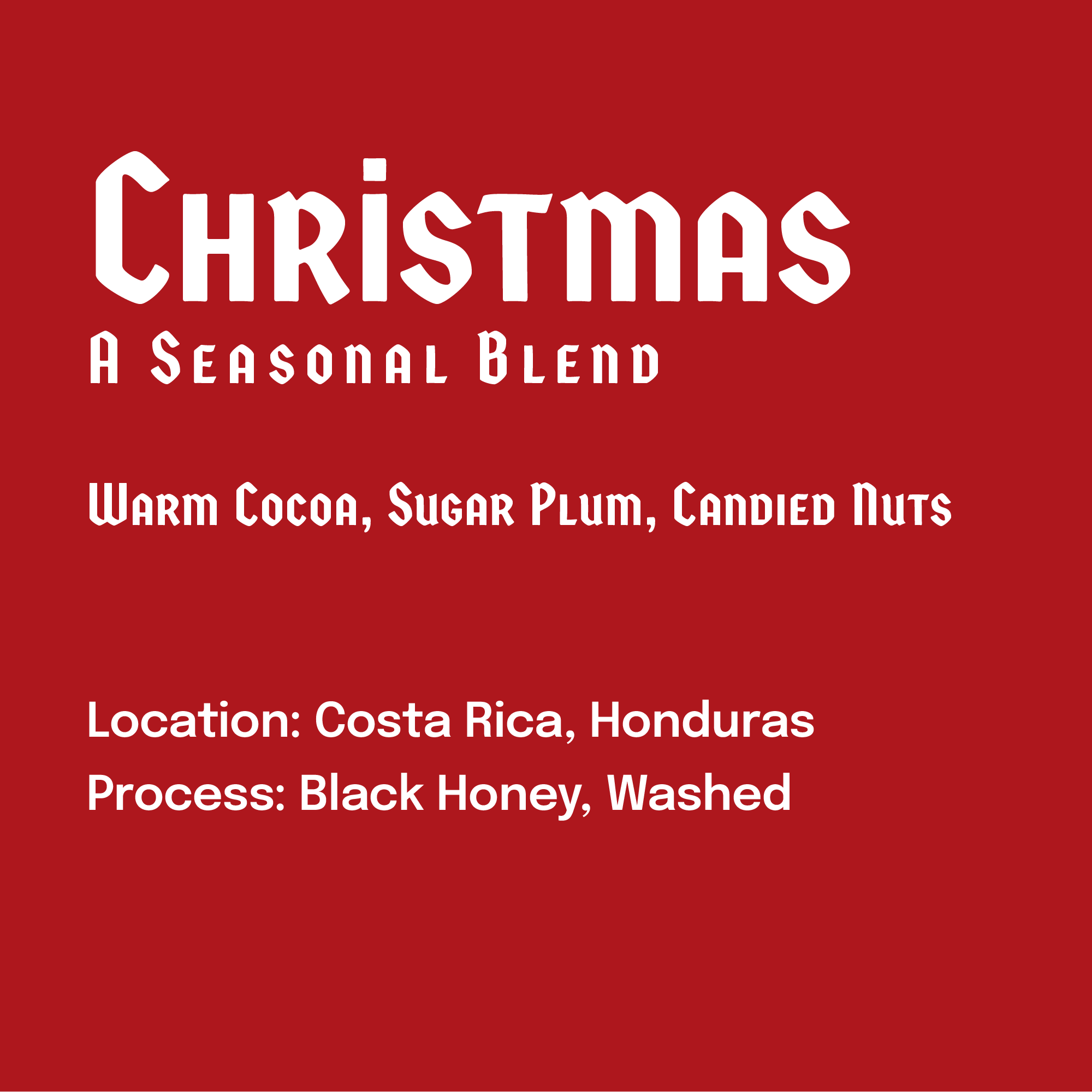 Red label with white text describing a coffee blend for Christmas, featuring tasting notes and origins.